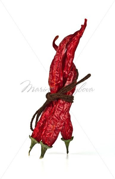 Three dried red chili peppers – Stock photos from around the world