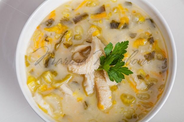 White bowl with Polish traditional tripe soup – flaki – Stock photos from around the world